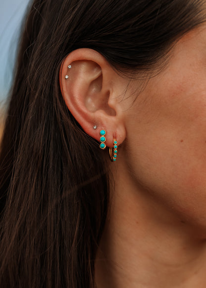 All around Turquoise Huggie earrings